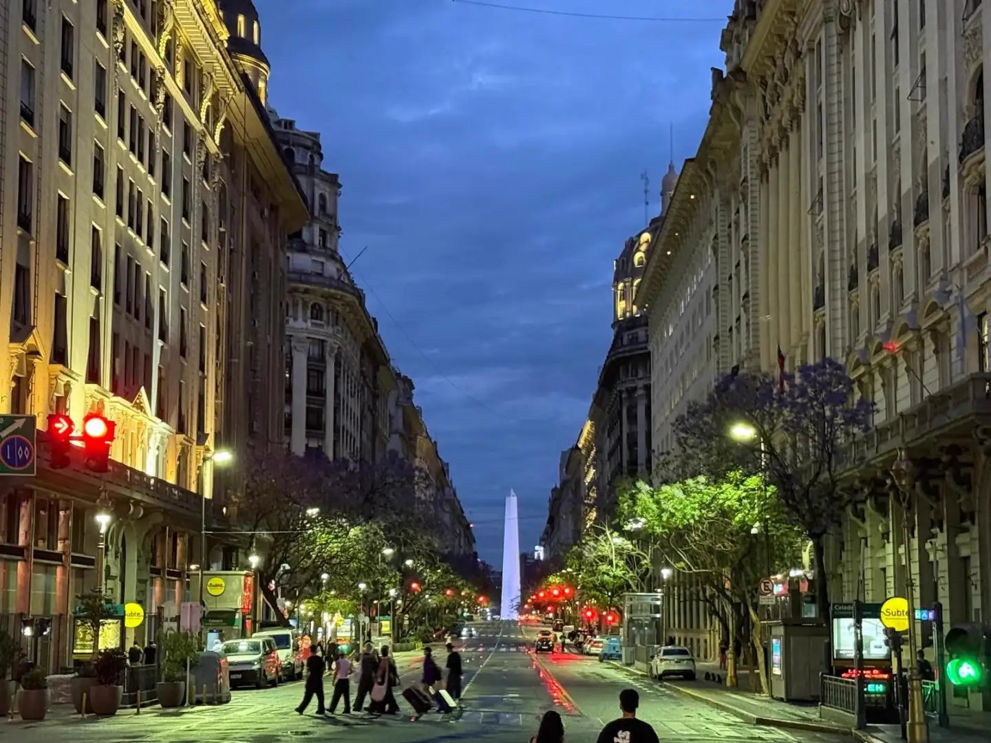 Diagonal Norte at blue hour, with the Obelisco at the end of the avenue